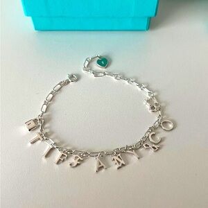 Tiffany & Co. Tiffany charms love notes dangle charm bracelet